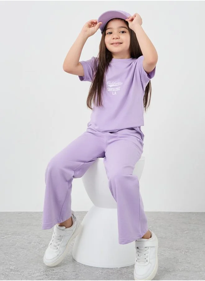 Styli Styli Slogan Print Oversized T-Shirt and Wide Leg Joggers Set