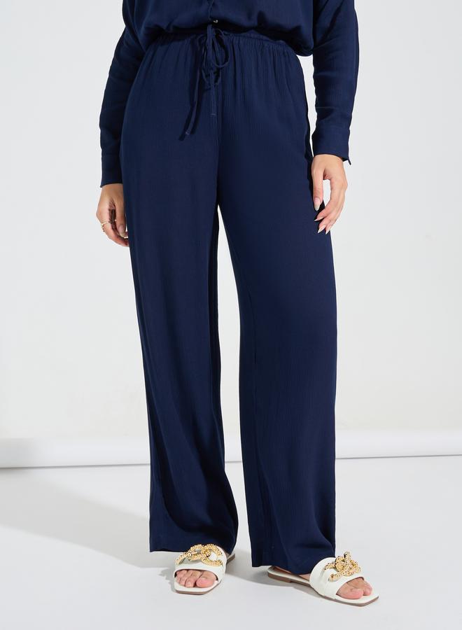 طقم قميص فضفاض مجعد وبنطلون واسع الساق