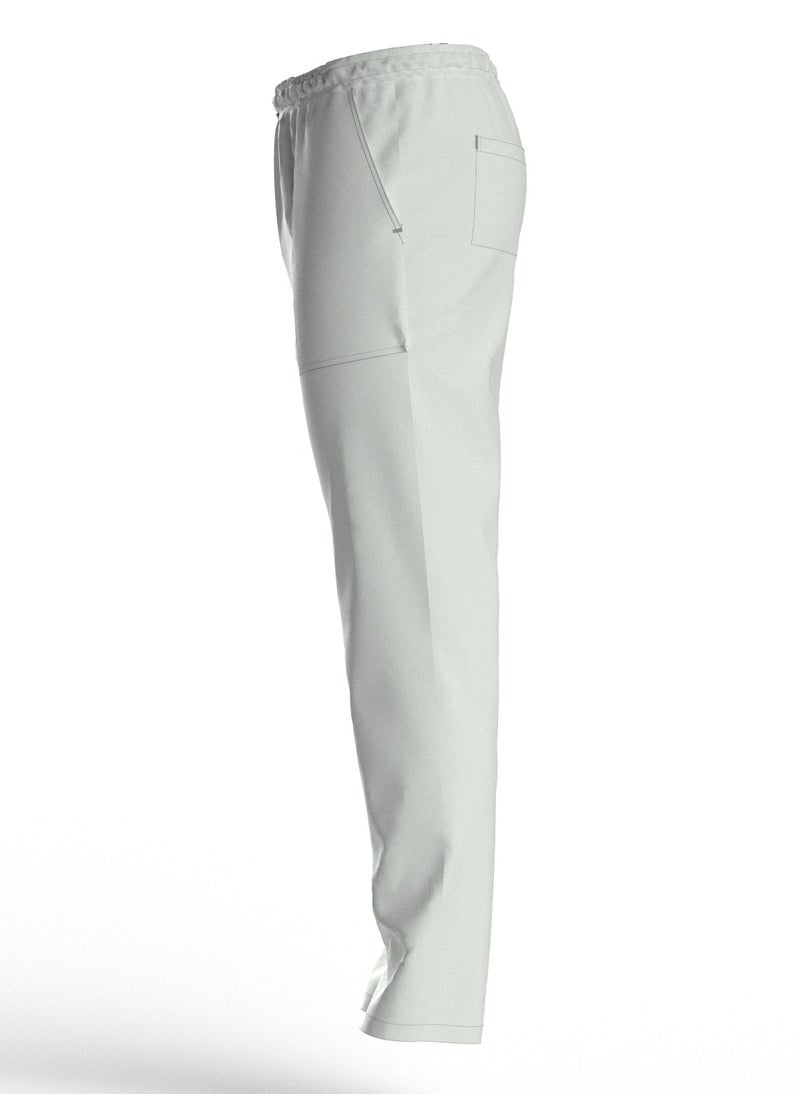 DR - Scrub Comfortable white Lycra fabric with many pockets is meticulously crafted to retain its color without fading with repeated washing - Image 1