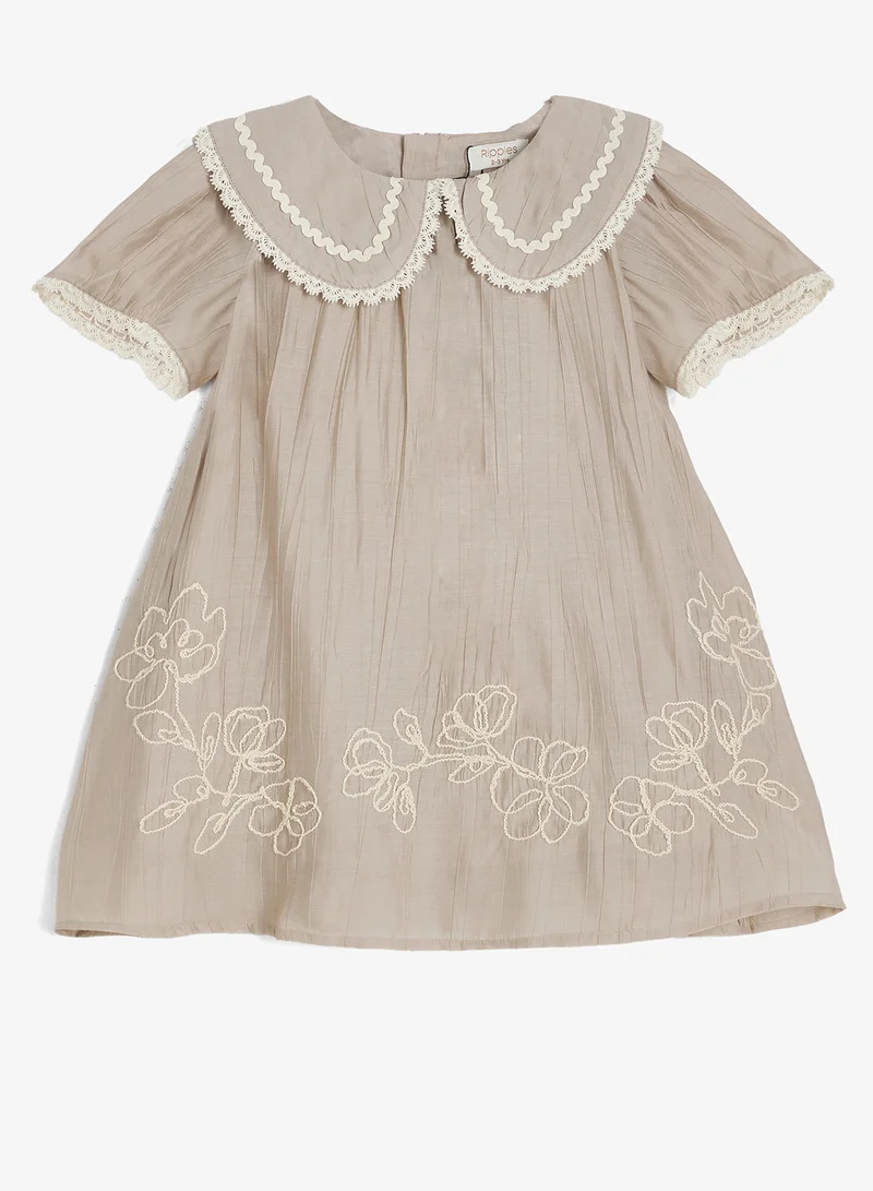 ريبلز مع نمشي Embroidered Baby Girls Dress with Lace Collar