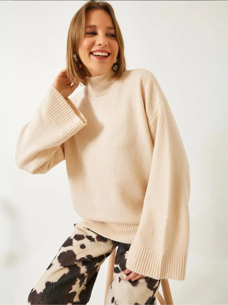 بيانكو لوتشي بلوفر لوكسي بنقشة منقطة بياقة نصف عالية مقاس كبير