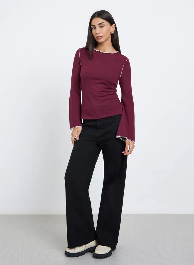 ستايلي بلوزة محبوكة بخياطة خارجية