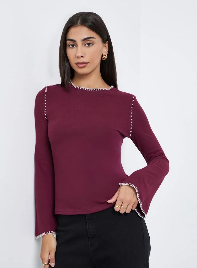 ستايلي بلوزة محبوكة بخياطة خارجية