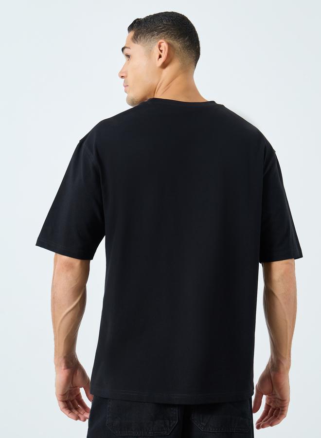Styli Men Black Oversized Graphic Print T-Shirt - Image 4