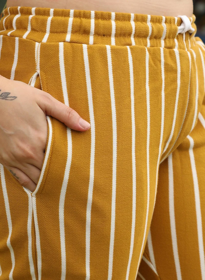 PINACOLADA  Women's Mustard Yellow Striped Trackpants for Women | Best Price UAE
