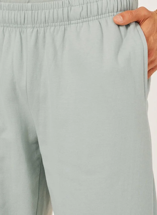 Styli Mid Rise Relaxed Fit Joggers with Badge Detail