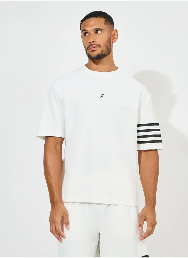 Styli Styli Oversized Stretch Pique Knit T-Shirt and Striped Shorts Set