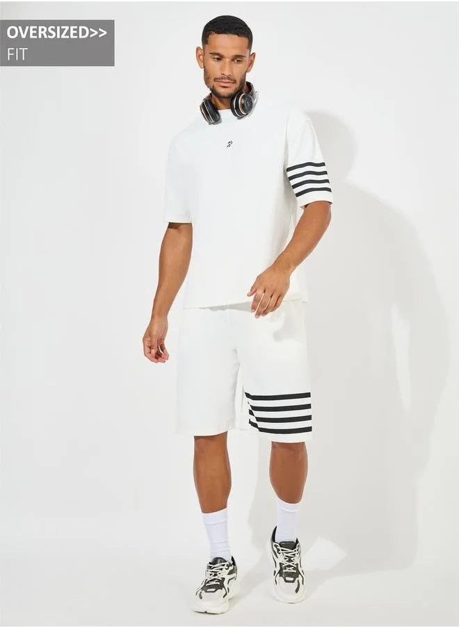 ستايلي Oversized Stretch Pique Knit T-Shirt & Striped Shorts Set