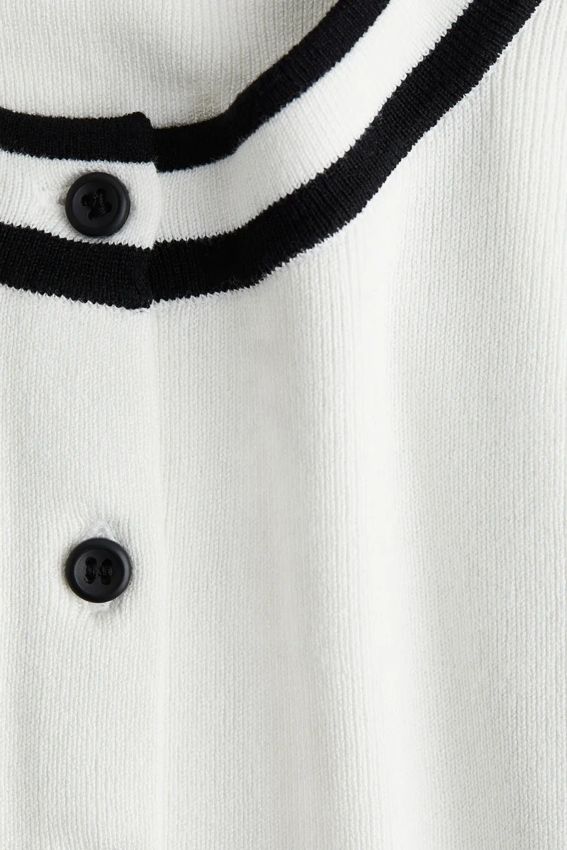 اتش اند ام فيست بتصميم كنزة بأزرار أمامية