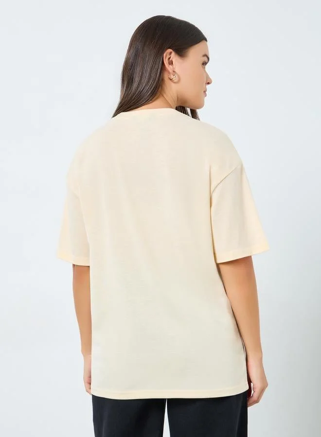 Styli Styli Beige Oversized Embellished Slogan T-Shirt