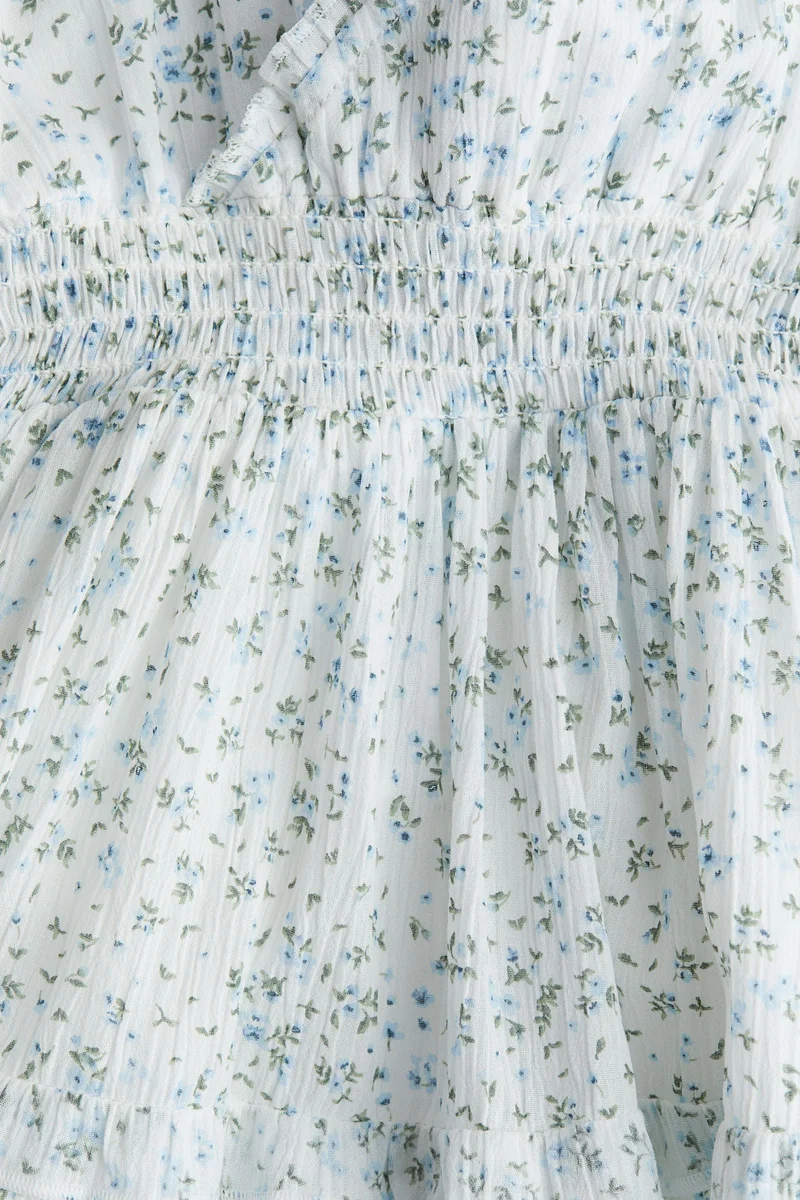 اتش اند ام فستان سموكد بحواف مكشكشة