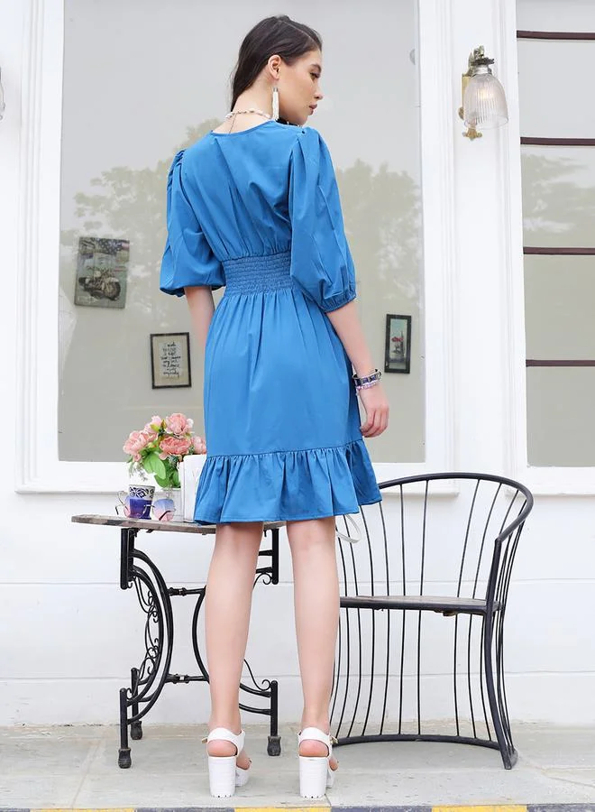 Sera Solid V Neck Ruffle Hem A-Line Mini Dress by Styli