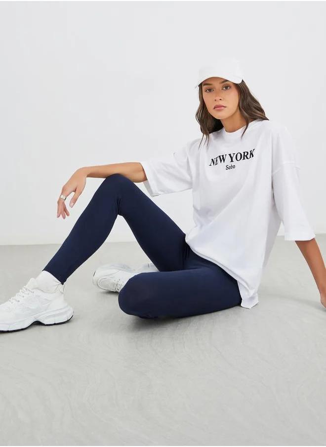 Styli Styli Text Embroidered Oversized T-Shirt and Badge Detail Leggings Co-Ords