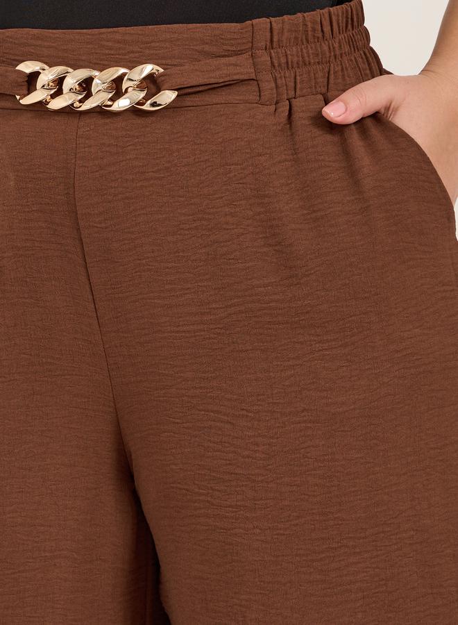 ستايلي بنطلون واسع الساق بنقوش مع تفاصيل حزام بسلسلة - Image 3