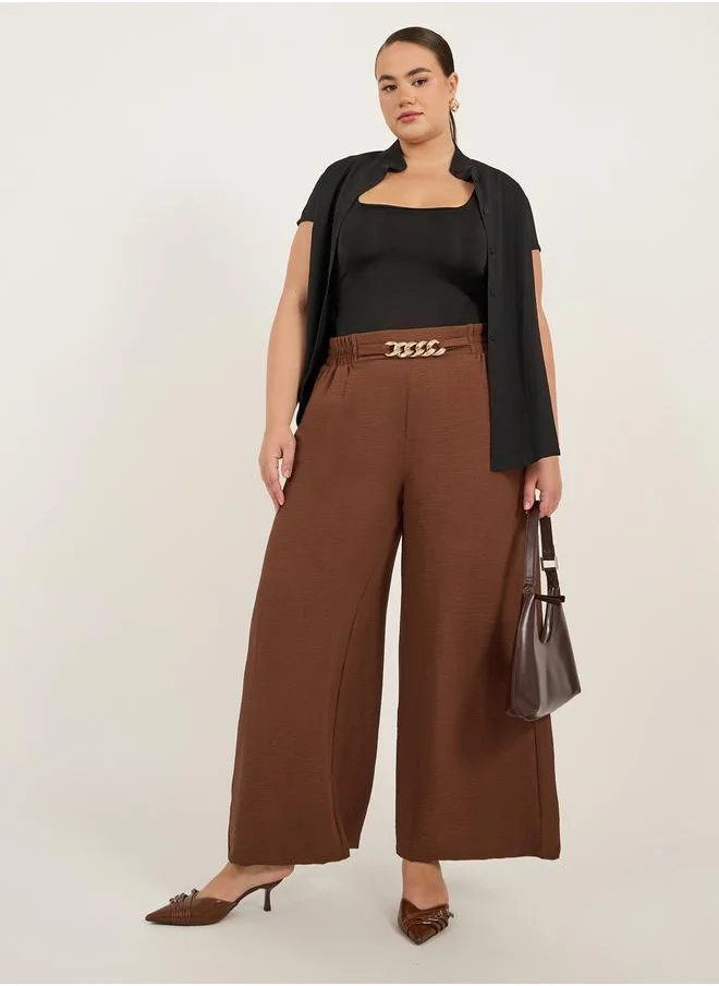 Styli Plus Size Textured Wide Leg Trousers with Chain Buckle Detail