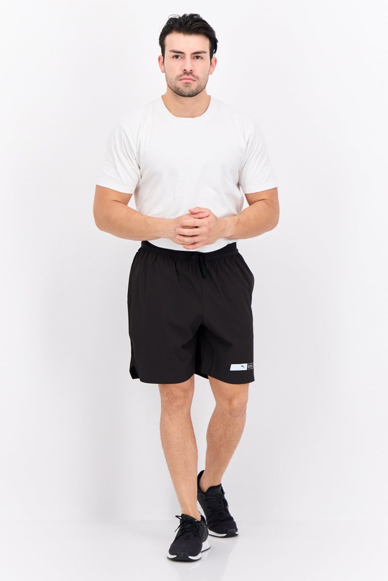 PUMA شورتات رياضية للرجال بشعار العلامة التجارية، خارجي، أسود - Image 4