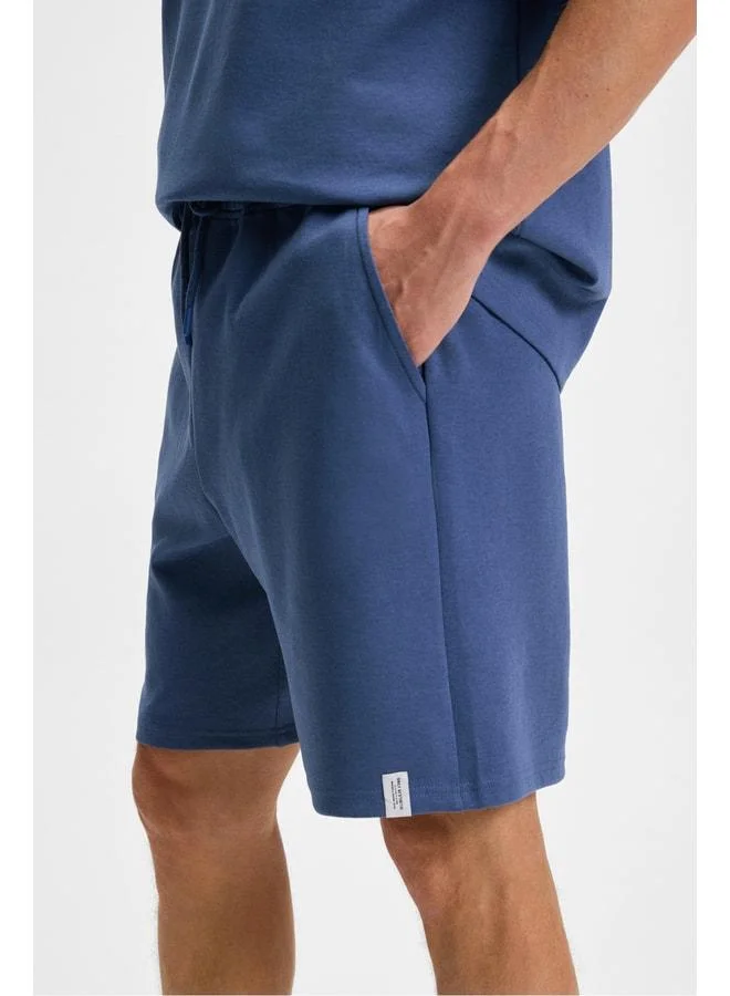 Grimelange BAILEY Men's Elastic Waist Back Single Pocket Corded Relaxed Fit Indigo Shorts.