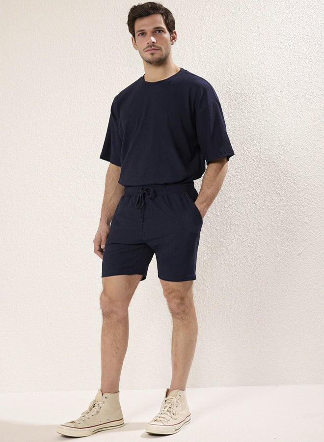 trendyol Basic Navy Blue Regular Cut Medium Length Laced Textured Wrinkle-Free Ottoman Shorts - Image 1