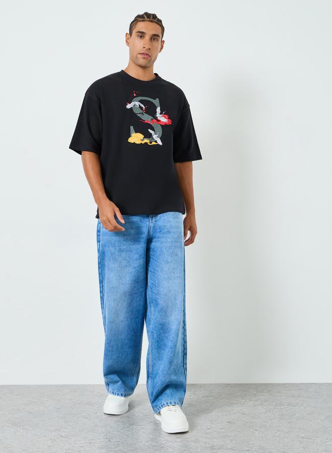 ستايلي تيشيرت واسع بقطن تيري وتفاصيل مُطرّزة - Image 2