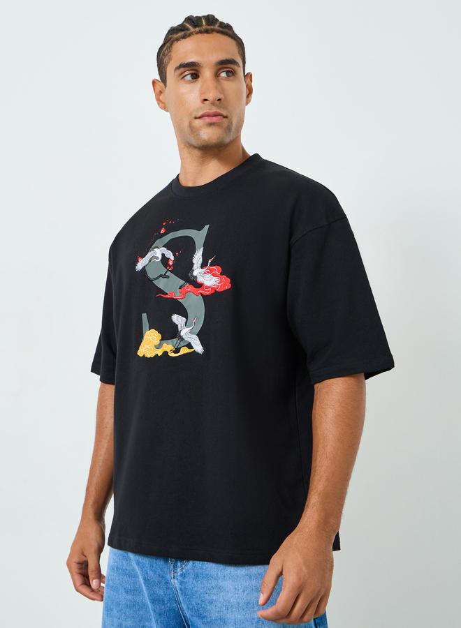 ستايلي تيشيرت واسع بقطن تيري وتفاصيل مُطرّزة - Image 3