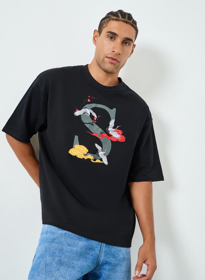 ستايلي تيشيرت واسع بقطن تيري وتفاصيل مُطرّزة - Image 1