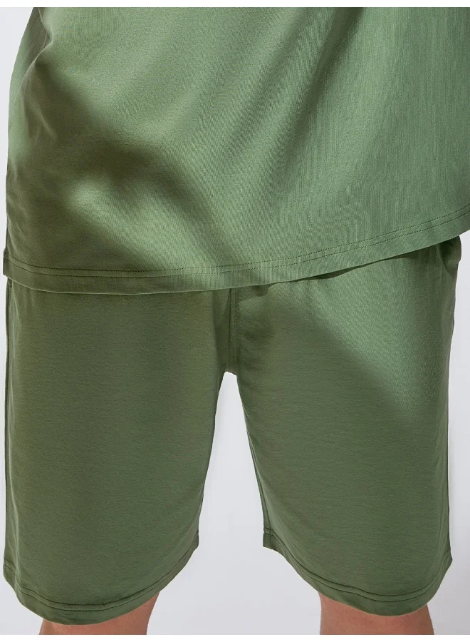 Maniac  Maniac Mens Solid Knee Length Green Cotton Slim Fit Shorts for Men | Best Price UAE