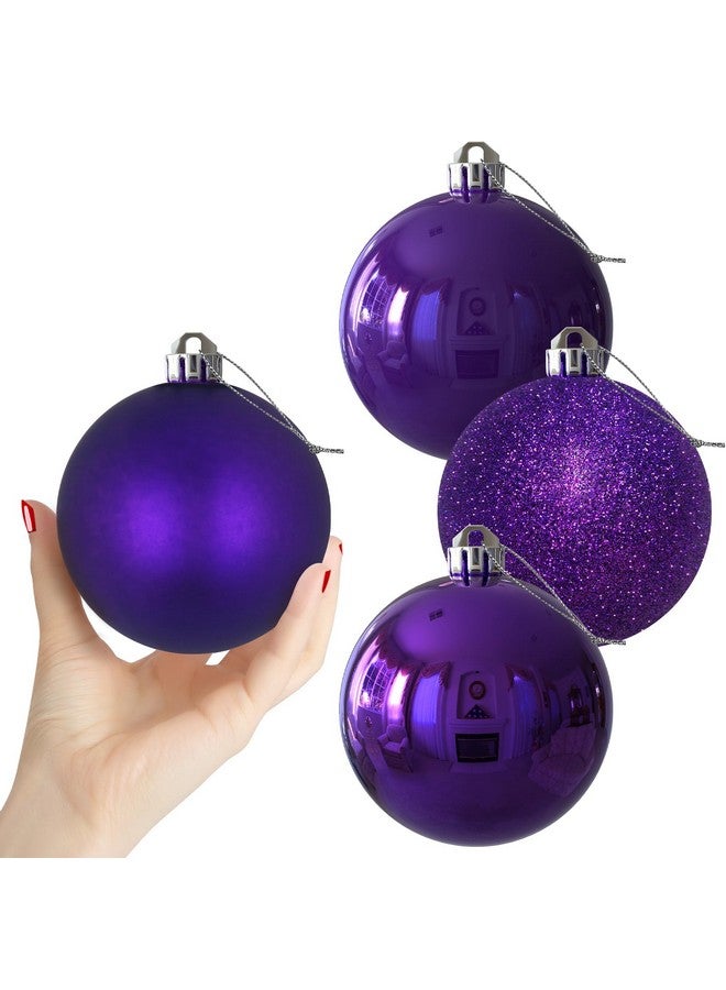 جايم إكسل كرات عيد الميلاد الأرجوانية الكبيرة مقاس 4.0 بوصة - زينة شجرة عيد الميلاد - كرات معلقة مقاومة للكسر لأعياد الميلاد والهالوين وحفلات الزفاف، مجموعة من 4 قطع - Image 1