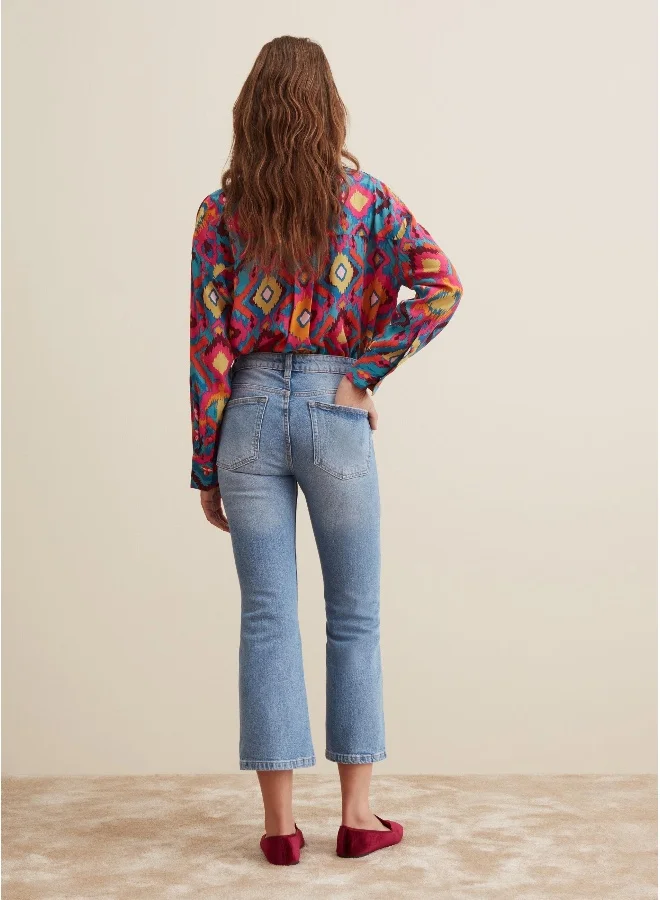 او في اس Flare-fit cropped jeans