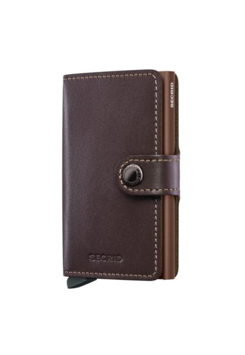 SECRID The MiniWallet is compact in size but has a surprising capacity The outer leather lining can hold bills receipts and cards while in the Cardprotector in all Chocolate - Image 2