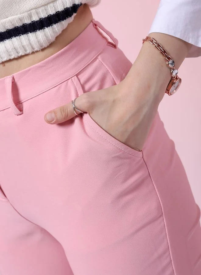 مرفوعة Women Tapered Solid Mid-Rise Pants