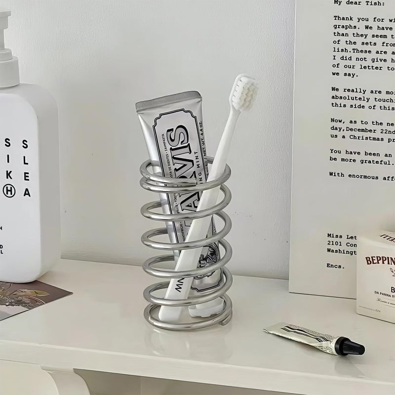 WREWING Spring Toothbrush Holder, Stainless Steel Spring Shaped Desktop Toothbrush Holder, Multifunctional Pen Holder Makeup Brush Toothbrush Storage for Bathroom Tabletop Dressing Table and Sink (Silvery) - Image 1