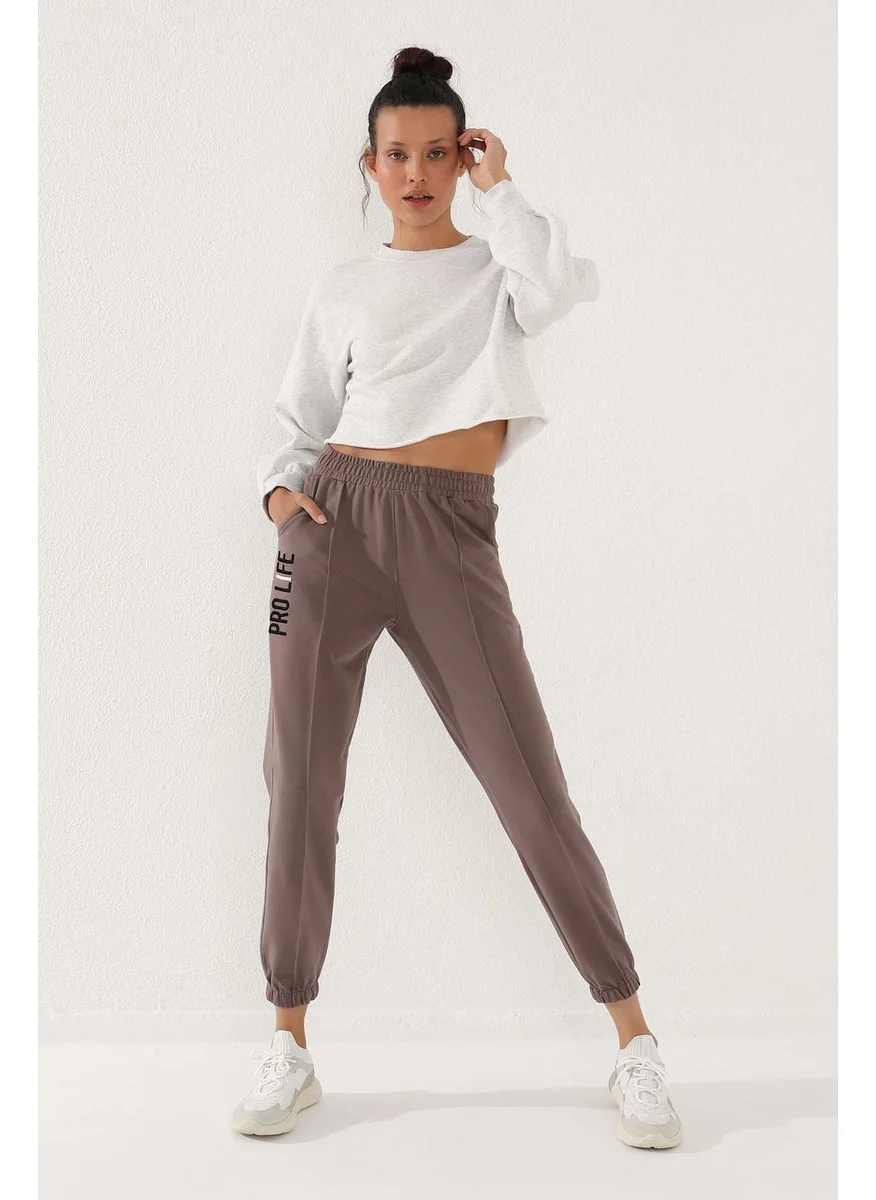 Tommy Life Pro Life Embroidered Front Garnish Earth Elastic Leg Women's Tracksuit Bottom