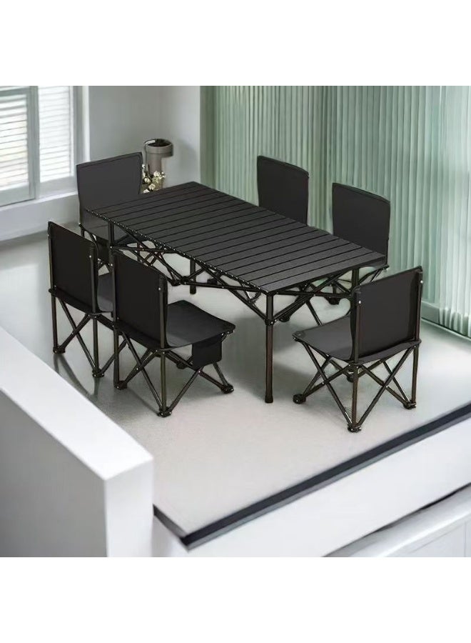 DubaiGallery A lightweight yet sturdy outdoor folding table paired with six compact chairs, designed for travel, camping, gardens, and patios, delivering reliable functionality, quick setup, excellent space efficiency, and a sleek black finish suitable for various outdoor dining and leisure environments. - Image 3