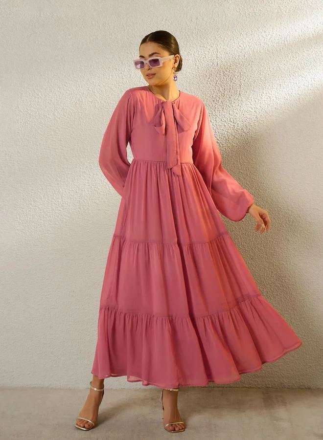 SASSAFRAS Pink Tie-Up Neck Long Sleeve Tiered Maxi Dress