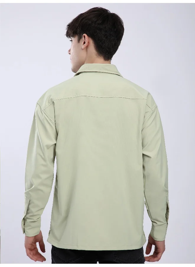 بيونغ قميص فضفاض بجيوب لون أخضر فاتح