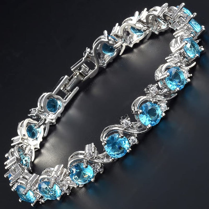 RIZILIA BLOSSOM Tennis Bracelet & Round Cut CZ [6 Colors available] in White Gold Plated, 7" (Blue Topaz) - Image 3