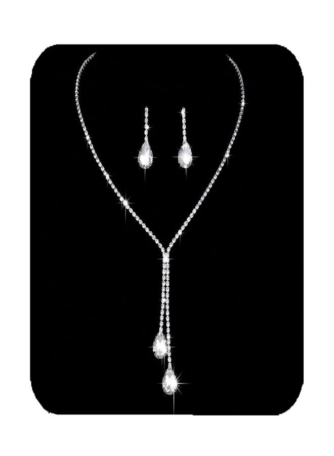 يونيكرا طقم مجوهرات زفاف من يونيكرا، يتضمن قلادة وأقراط، مصنوع من الفضة والكريستال، مرصع بأحجار الراين، مناسب للنساء والعرائس. - Image 1