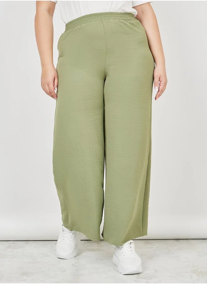Styli Textured High Rise Wide Leg Pants