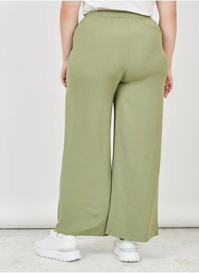 ستايلي Textured High Rise Wide Leg Pants
