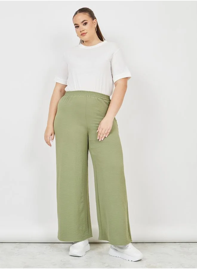 Styli Textured High Rise Wide Leg Pants