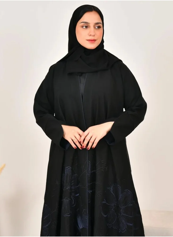 lamha abaya Black, flared abaya with elegant navy blue embroidery at the bottom of the abaya