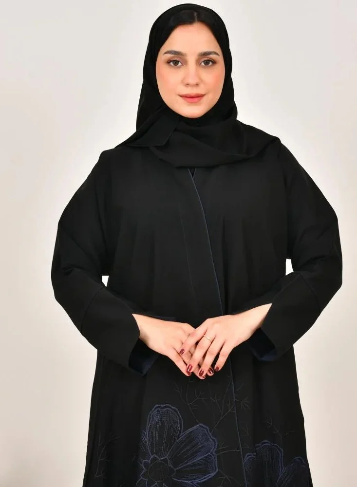 lamha abaya Black, flared abaya with elegant navy blue embroidery at the bottom of the abaya