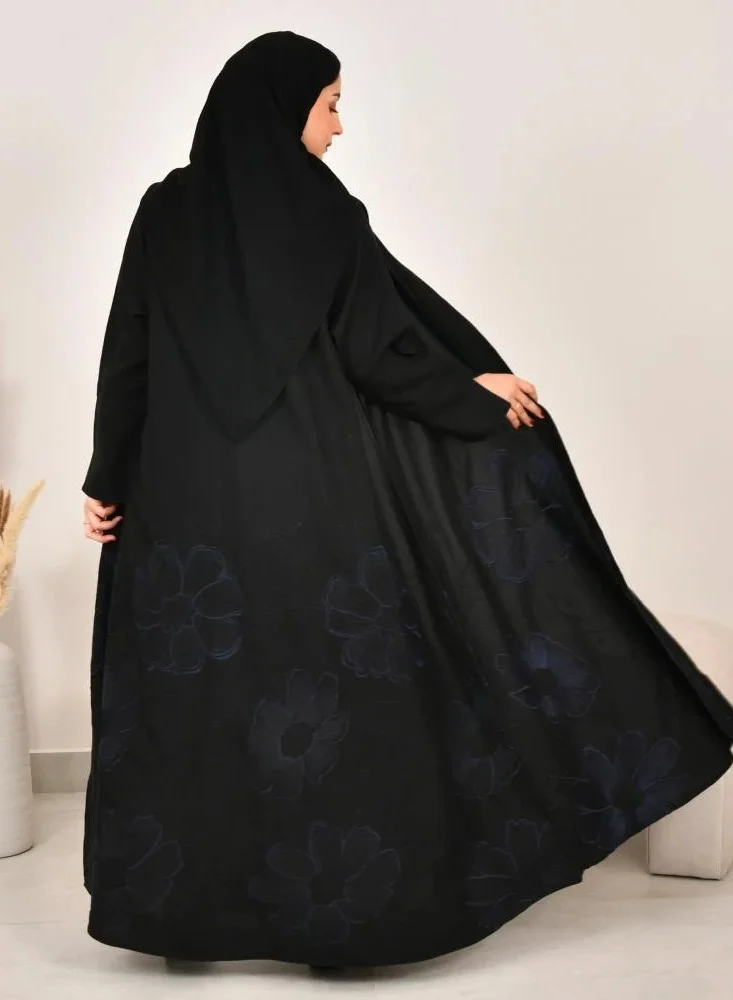 lamha abaya Black, flared abaya with elegant navy blue embroidery at the bottom of the abaya