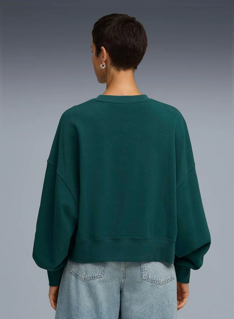 PUMA Oversized Graphic Women's Crew Sweatshirt