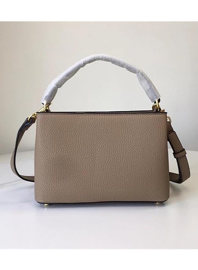 توري بورش Tory Burch عبارة عن حقيبة حمل بسيطة وقابلة للتعديل والفصل - Image 2