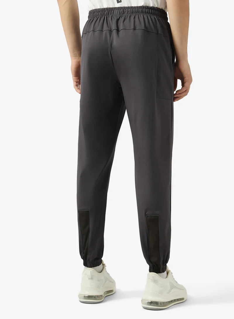 FRWD  Regular Fit With Reflective Trims Track Pants for Men | Best Price UAE