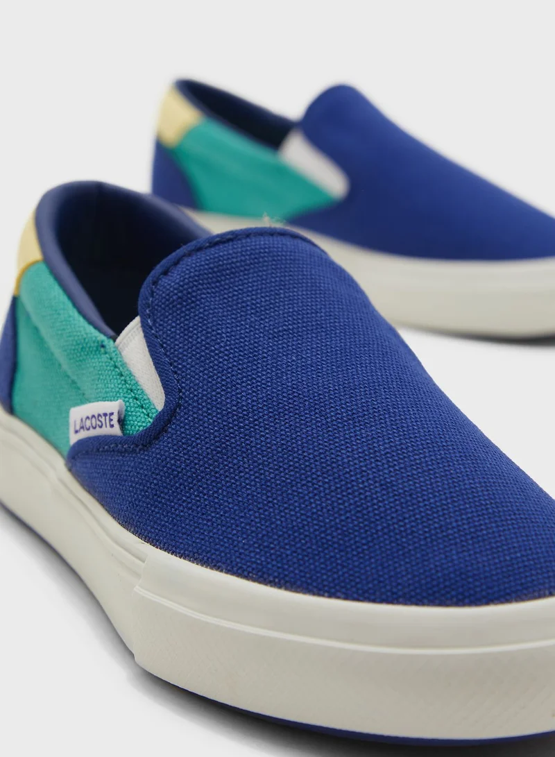 LACOSTE Kids Jump Serve Slip Ons