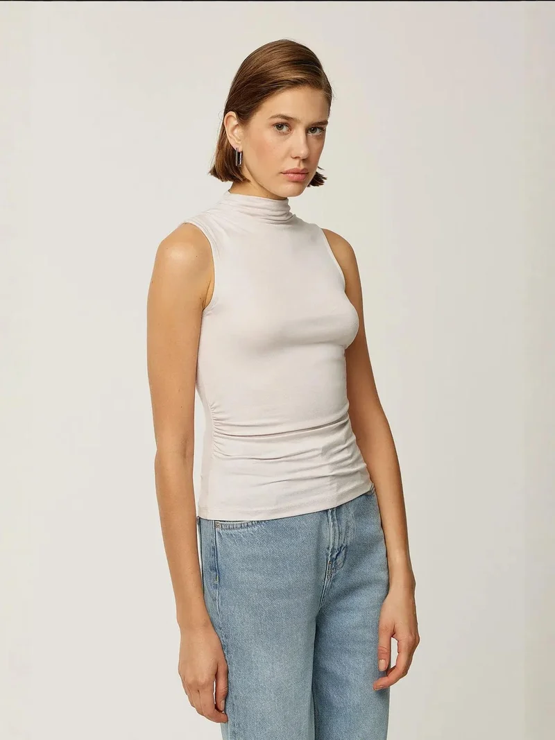 زوبعة بلوزة بدون أكمام بياقة متدلية