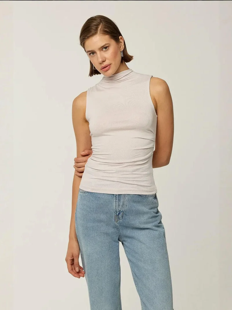 زوبعة بلوزة بدون أكمام بياقة متدلية