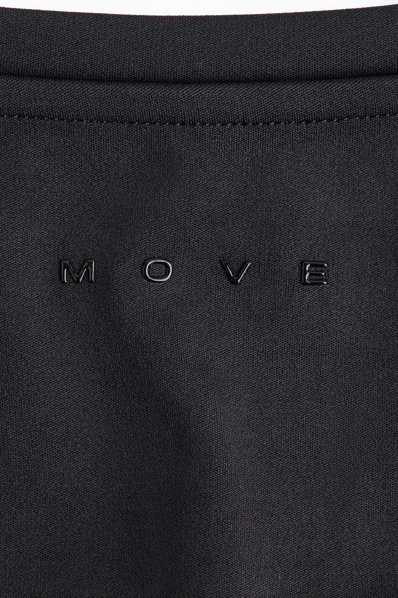 اتش اند ام بلوزة رياضية بياقة مربعة من قماش دراي موف